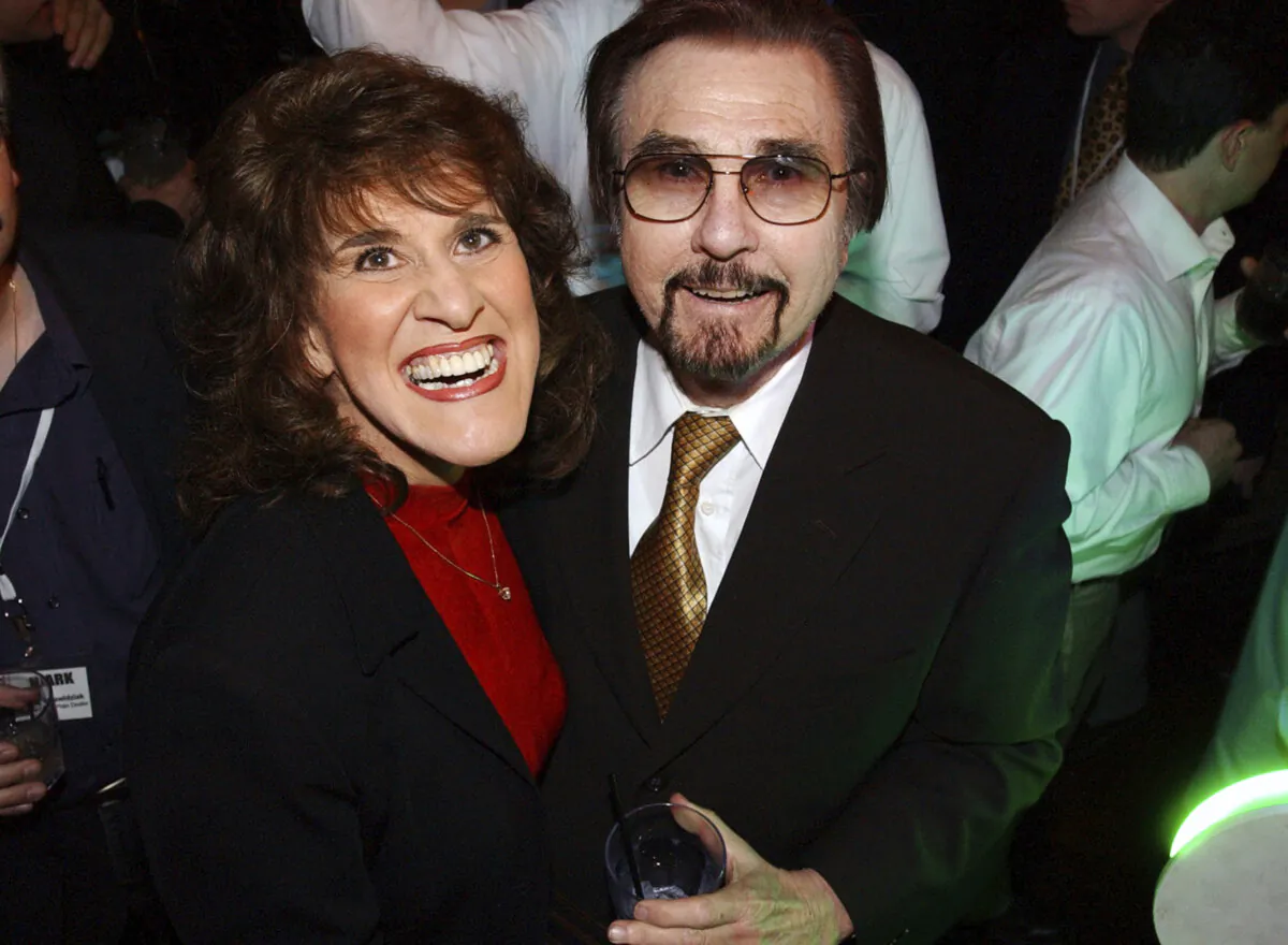 "Rowan & Martin's Laugh-In" costars Ruth Buzzi and Gary Owens share a laugh during NBC's 75th Anniversary Party in Los Angeles on Jan. 9, 2002. (Rene Macura/AP Photo)