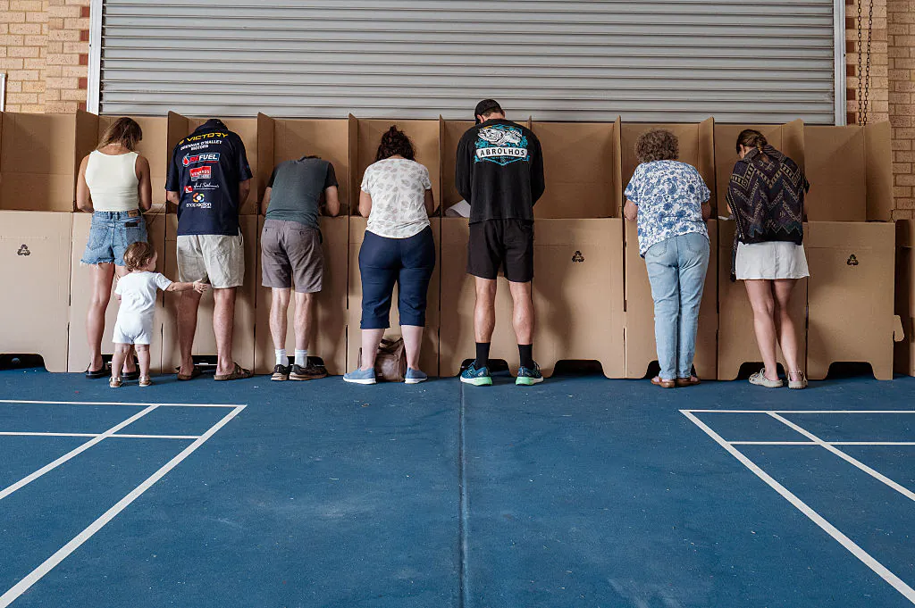People at the voting booths inside the Geraldton Primary school voting location in Geraldton, Australia, on May 3, 2025. (Tamati Smith/Getty Images)