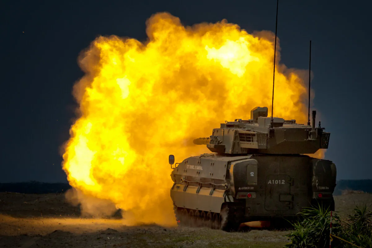 A Sabrah Light Tank fires a round during a counter landing live fire exercise at a beach as part of U.S.-Philippines joint military exercises in Aparri, Cagayan province, Philippines, on May 3, 2025. More than 14,000 Filipino and U.S. troops are taking part in this year's Balikatan, or "shoulder-to-shoulder," exercises, billed as the "Super Bowl" of military drills in the region. (Ezra Acayan/Getty Images)