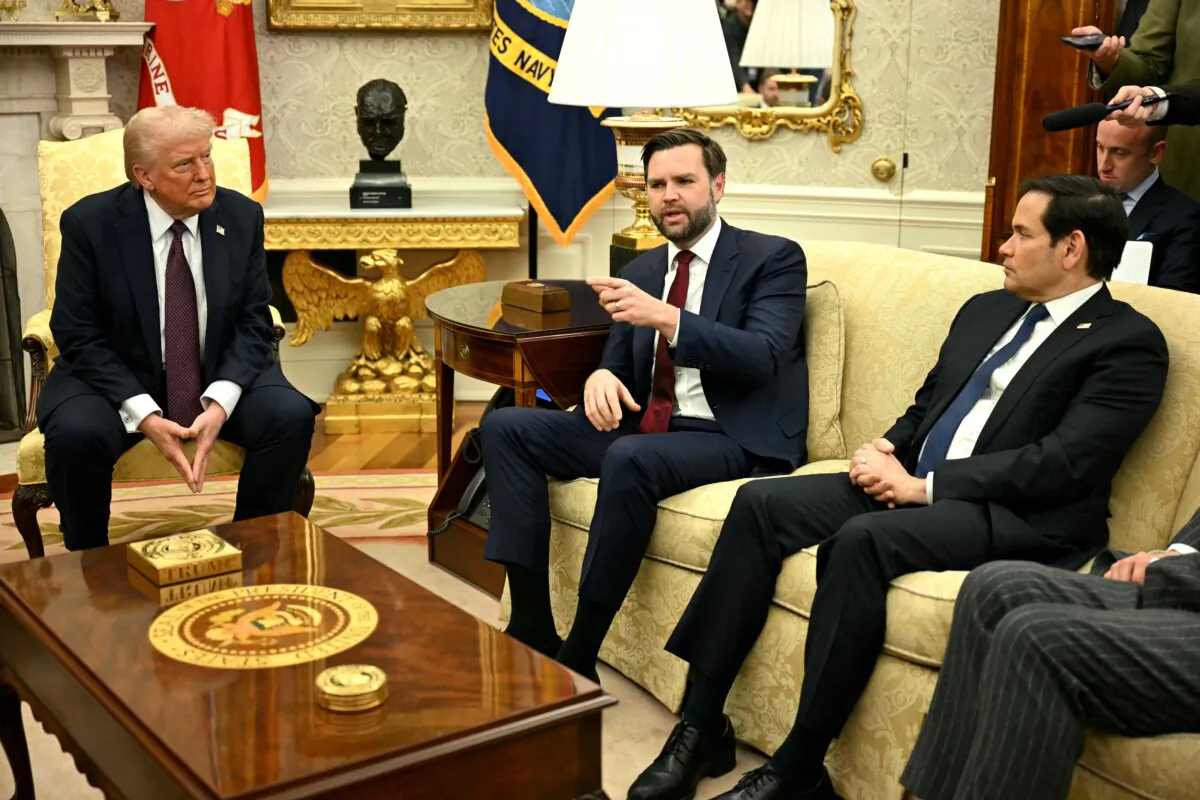 President Donald Trump and Secretary of State Marco Rubio listen to Vice President JD Vance speak during a bilateral meeting with British Prime Minister Keir Starmer in the Oval Office of the White House on Feb. 27, 2025. (Jim Watson/AFP via Getty Images)