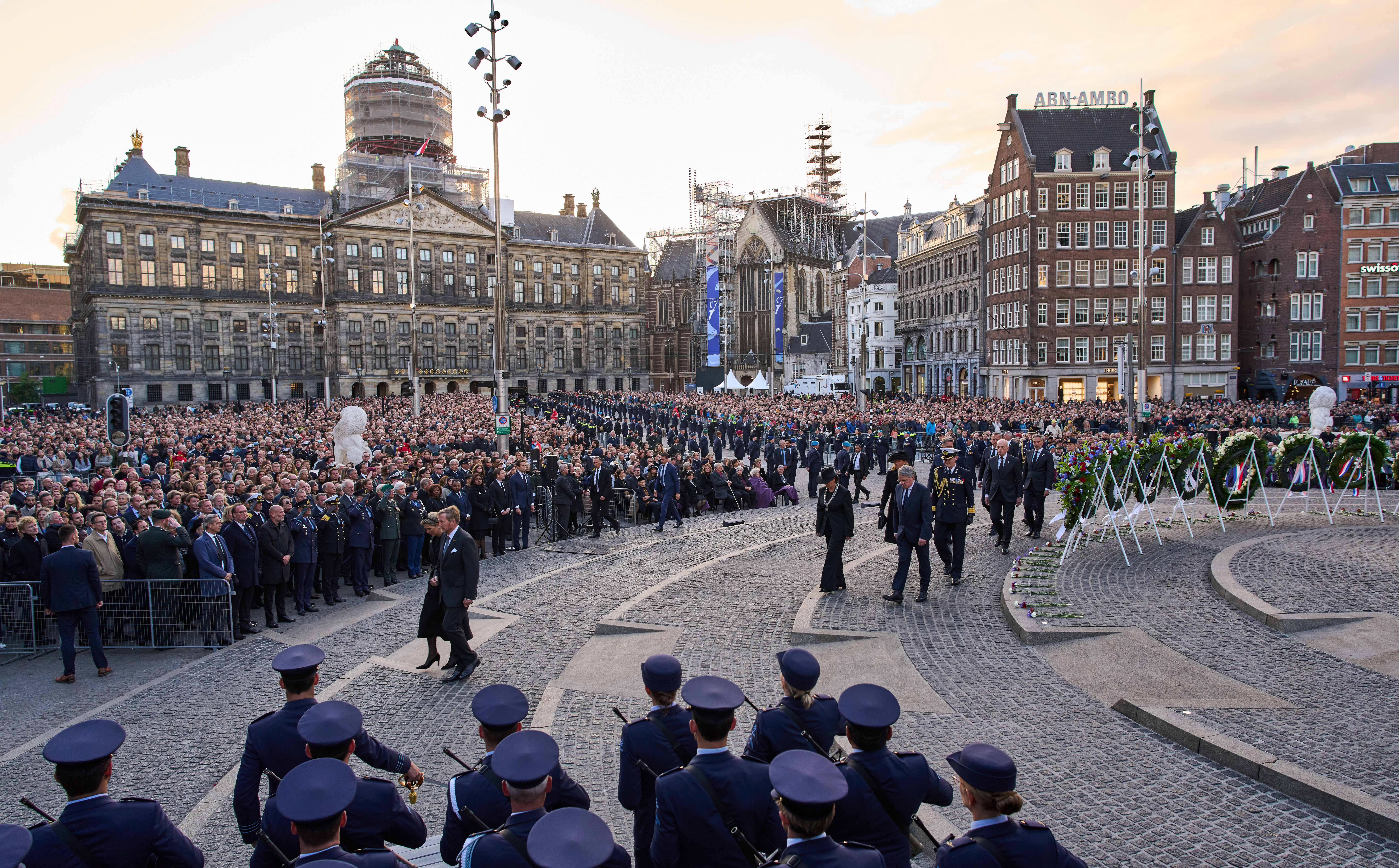 Day in Photos: War Commemoration, Attack on Kyiv, and a Mud Race