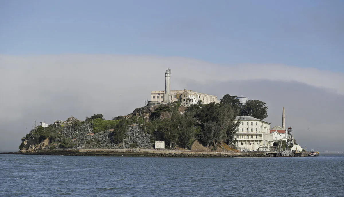 Fog lingers behind Alcatraz Island in San Francisco on July 1, 2015. (Eric Risberg/AP Photo)