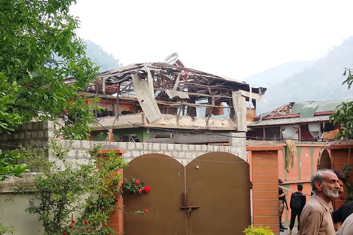 A damaged portion of Bilal Mosque is seen after it was hit by an Indian strike in Muzaffarabad, the capital of Pakistan-administered Kashmir, on May 7, 2025. (Stringer/Reuters)