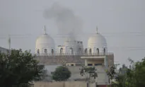 Pakistan Threatens to Respond After Indian Air Strikes Kill 26