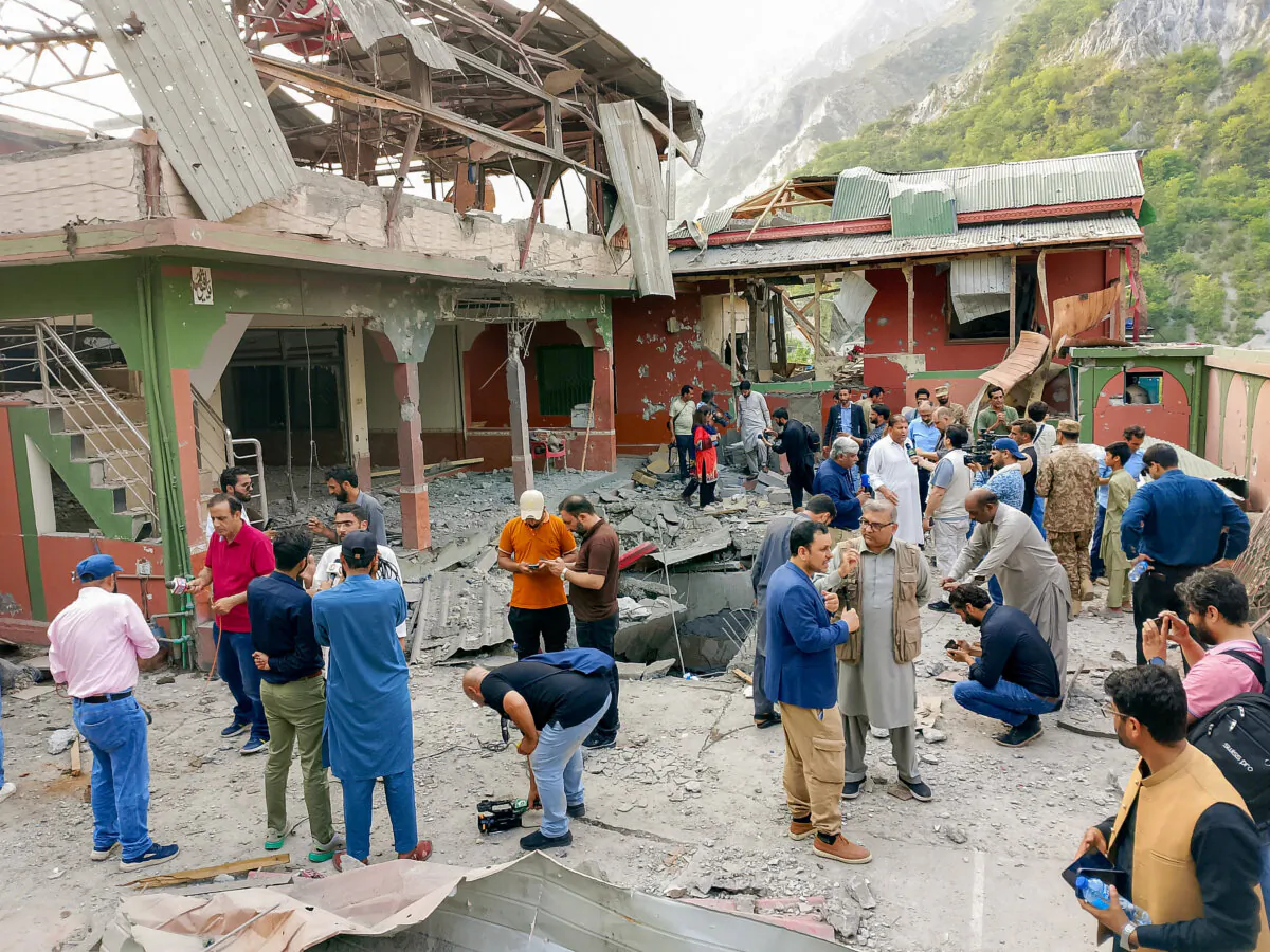 International media visit a mosque after Indian strikes in Muzaffarabad, the capital of Pakistan-administered Kashmir, on May 7, 2025. (Zubair Abbasi /Middle East Images/AFP via Getty Images)