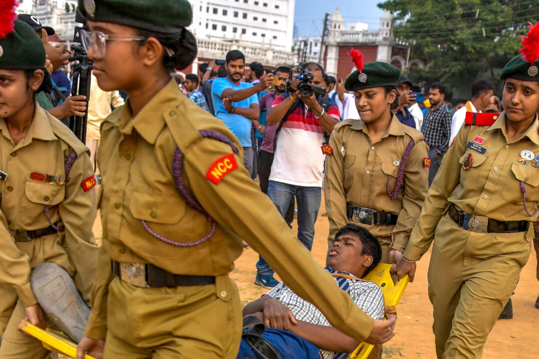 Day in Photos: Military Exercises in India, Strikes on Yemen, and Golden Snub-Nosed Monkeys