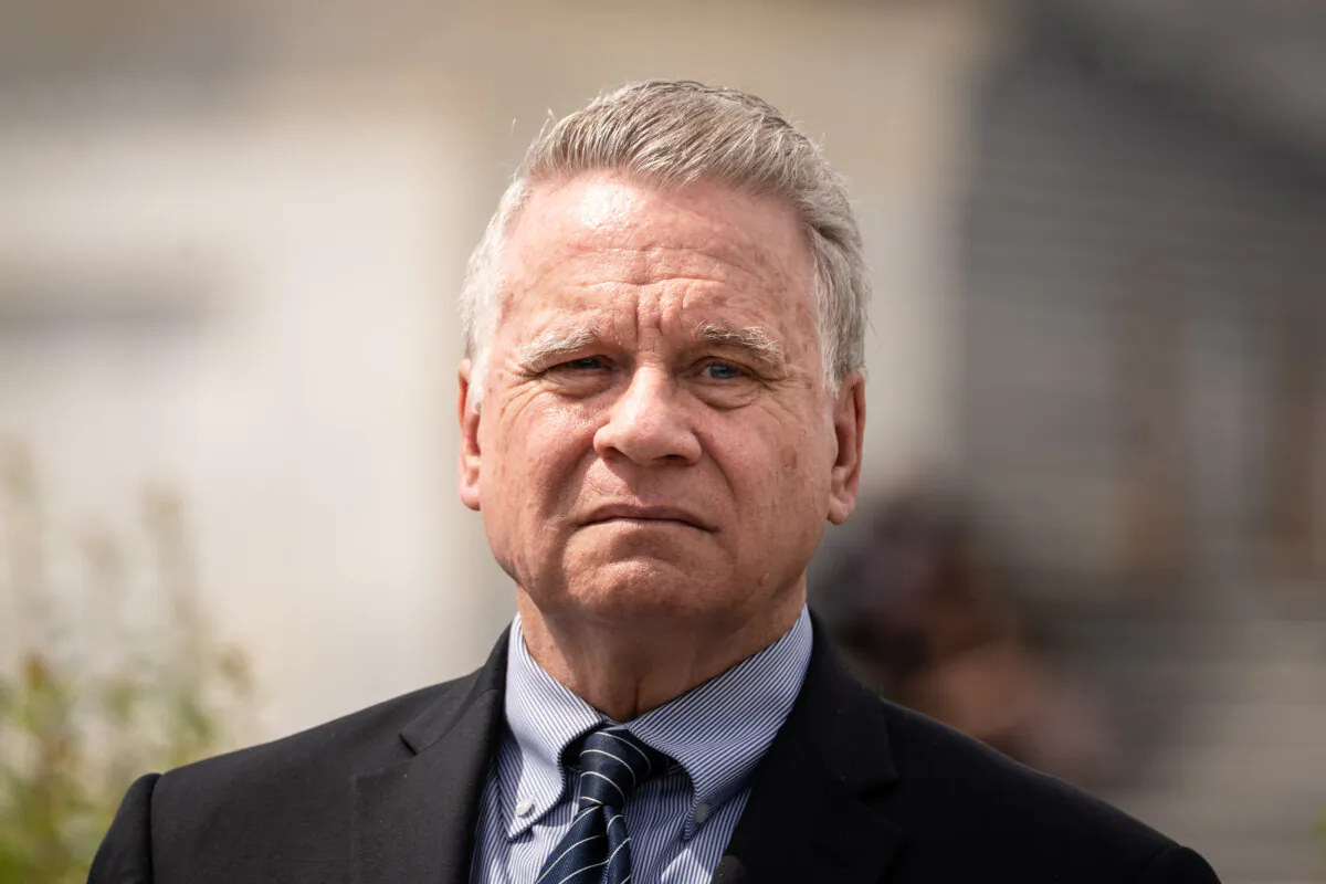 Rep. Chris Smith (R-N.J.), co-chair of the Congressional-Executive Commission on China, listens during a press conference about the Stop Forced Organ Harvesting Act passed by the House, on Capitol Hill in Washington on May 7, 2025. (Madalina Vasiliu/The Epoch Times)