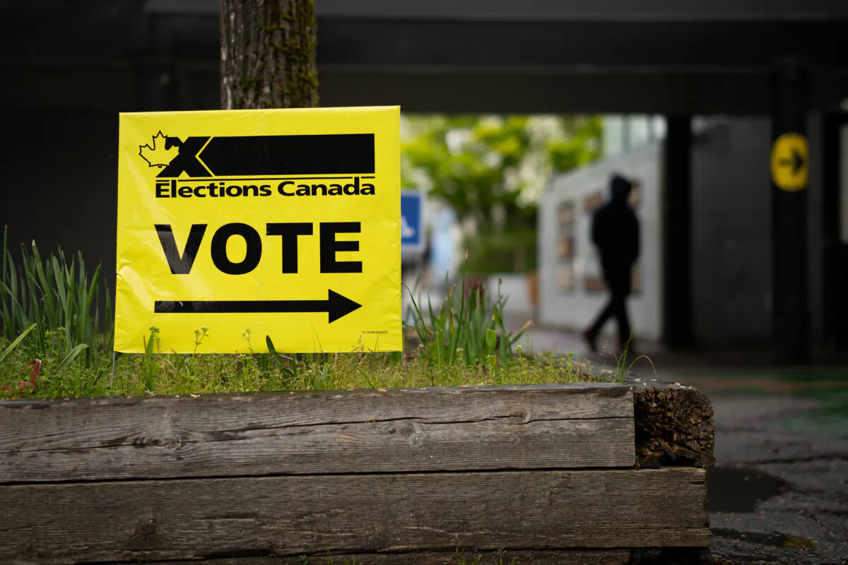 A person enters a polling station in the Vancouver East riding on federal election day in Vancouver on April 28, 2025. (The Canadian Press/Ethan Cairns) 