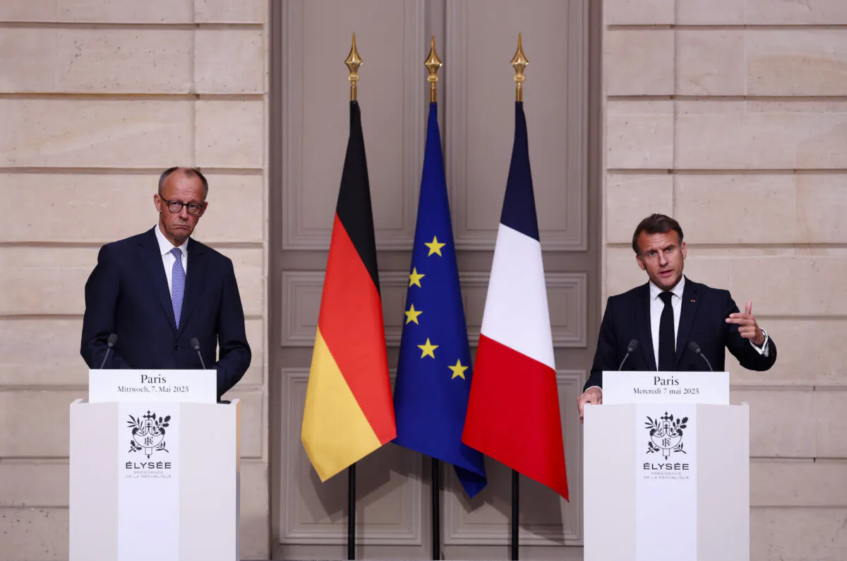 French President Emmanuel Macron (R) and German Chancellor Friedrich Merz speak to the media after talks at the Élysée Palace, in Paris, on May 7, 2025. (Sean Gallup/Getty Images)
