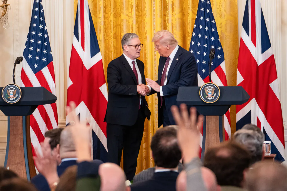 UK Prime Minister Sir Keir Starmer and U.S. President Donald Trump shake hands after a joint press conference at the White House in Washington on Feb. 27, 2025. (Madalina Vasiliu/The Epoch Times)