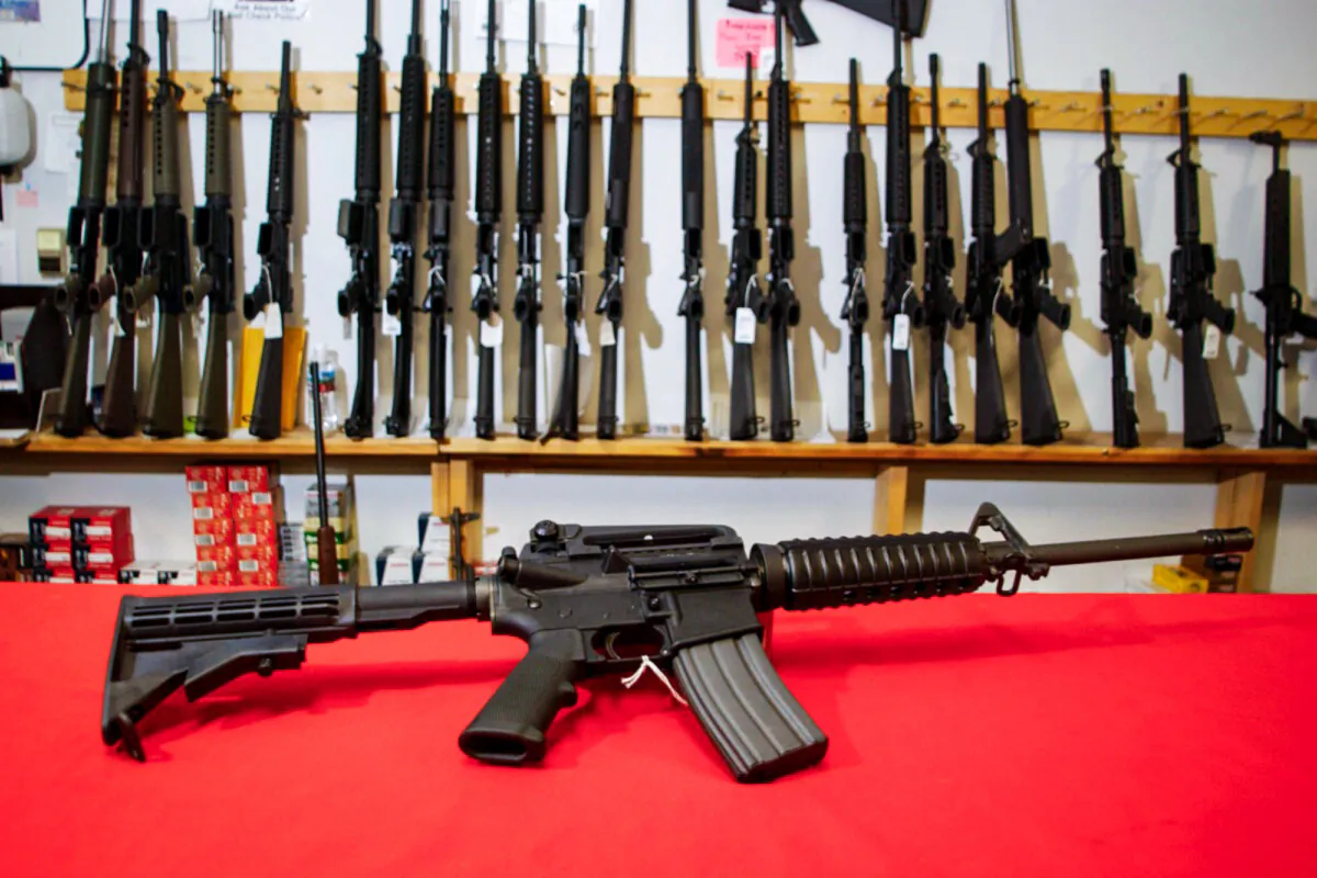 A Colt AR-15 sits on the counter of Dave's Guns in Denver on Sept. 13, 2004. (Thomas Cooper/Getty Images)