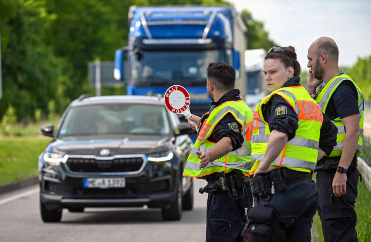 German federal police officers control cars at the A3 motorway at a border control station between Emmerich, Germany, and Arnhem, the Netherlands, on May 8, 2025. (Ina Fassbender/AFP via Getty Images)