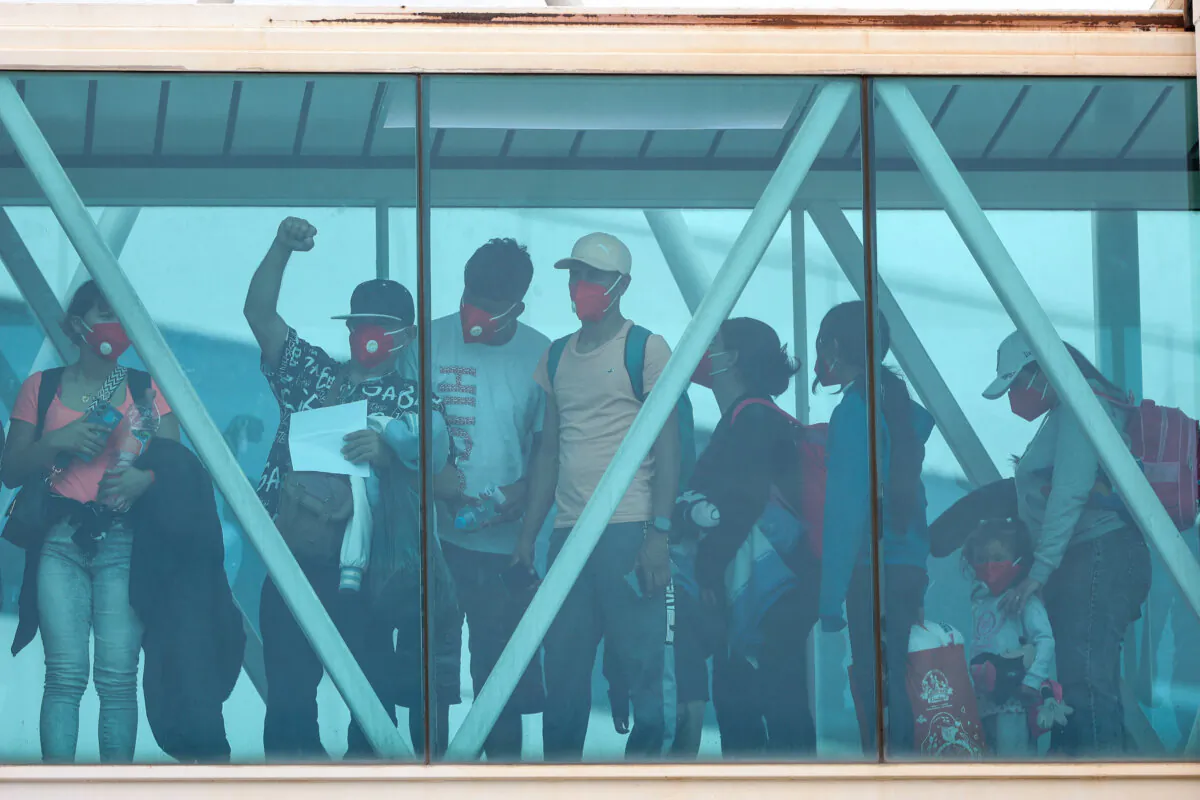 Venezuelan migrants repatriated from Honduras arrive at Simon Bolivar International Airport in Maiquetia, Venezuela on May 8, 2025. (Pedro Mattey/AFP via Getty Images)