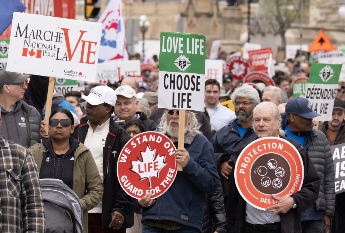Pro-life supporters take part in the March for Life event in downtown Ottawa on May 8, 2025. (The Canadian Press/Adrian Wyld)