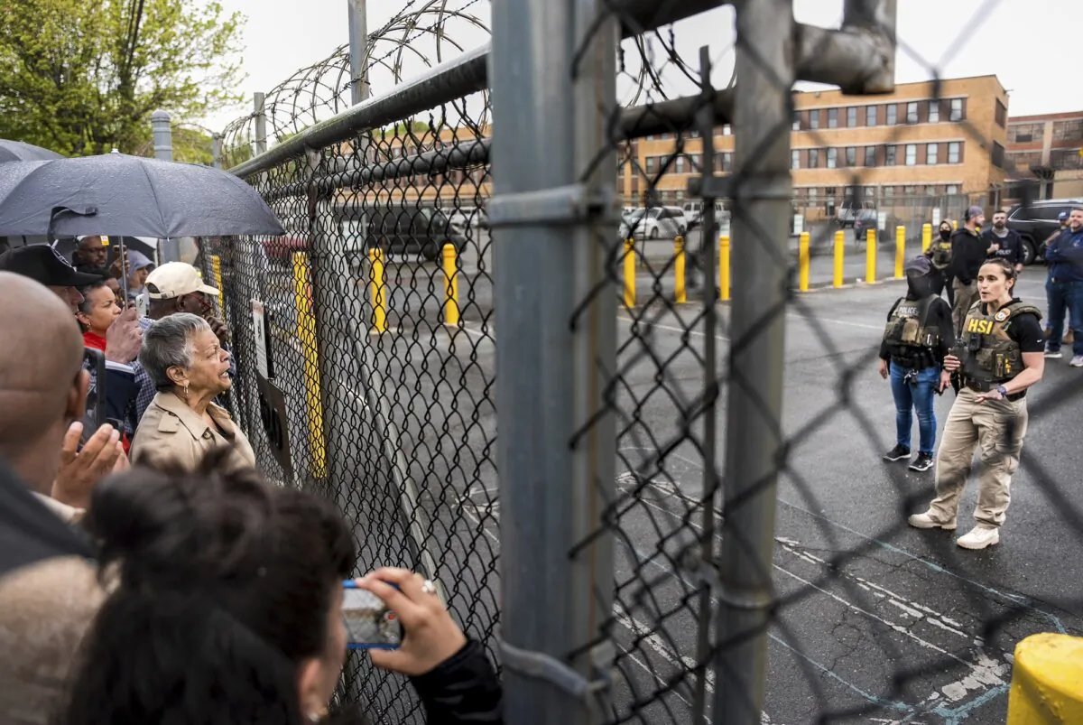 Rep. Bonnie Watson Coleman (D-N.J.) speaks with an officer outside an Immigration and Customs Enforcement detention facility in Newark, N.J., on May 9, 2025. (Angelina Katsanis/AP Photo)