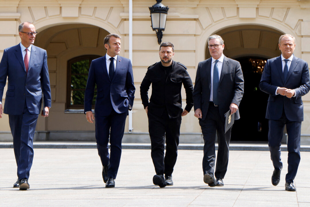 NextImg:Day in Photos: European Leaders in Kyiv, Toxic Fire in Spain, and Tartan Day Parade