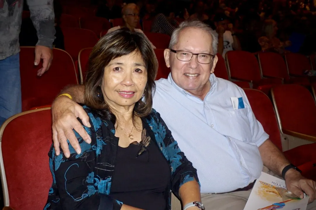 Tim Hopkins (R) attended a Shen Yun Performing Arts performance at the Blaisdell Concert Hall in Honolulu, Hawaii, on May 10, 2025. (Yeawen Hung/The Epoch Times)