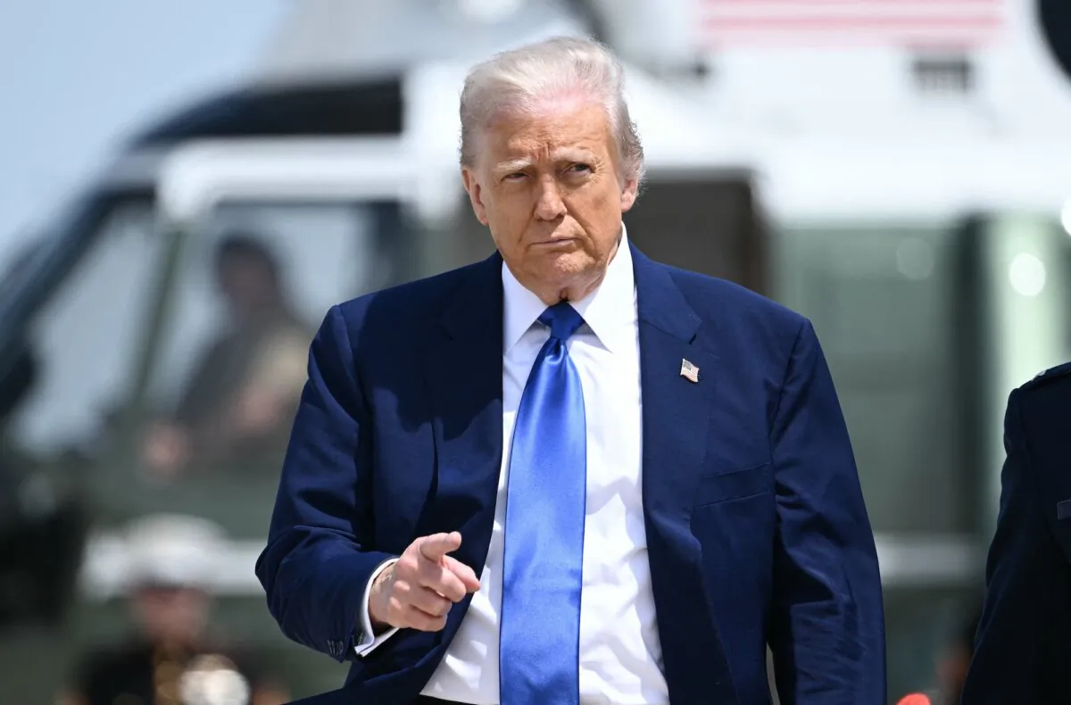 President Donald Trump walks to Air Force One at Joint Base Andrews in Maryland on May 12, 2025. (Brendan SMIALOWSKI / AFP)