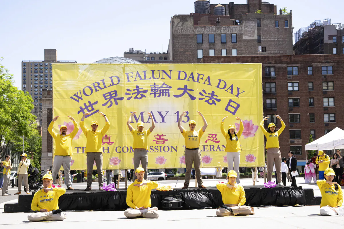 Falun Gong practitioners celebrate World Falun Dafa Day at Union Square in New York City on May 11, 2025. (Larry Dye/The Epoch Times)
