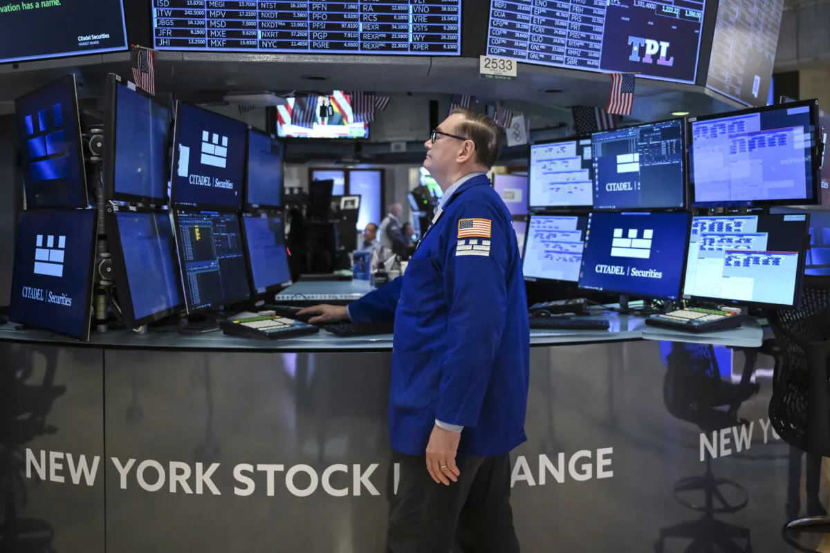 Traders work on the floor of the New York Stock Exchange (NYSE) at the opening bell in New York City on May 12, 2025. (Angela Weiss/AFP via Getty Images)