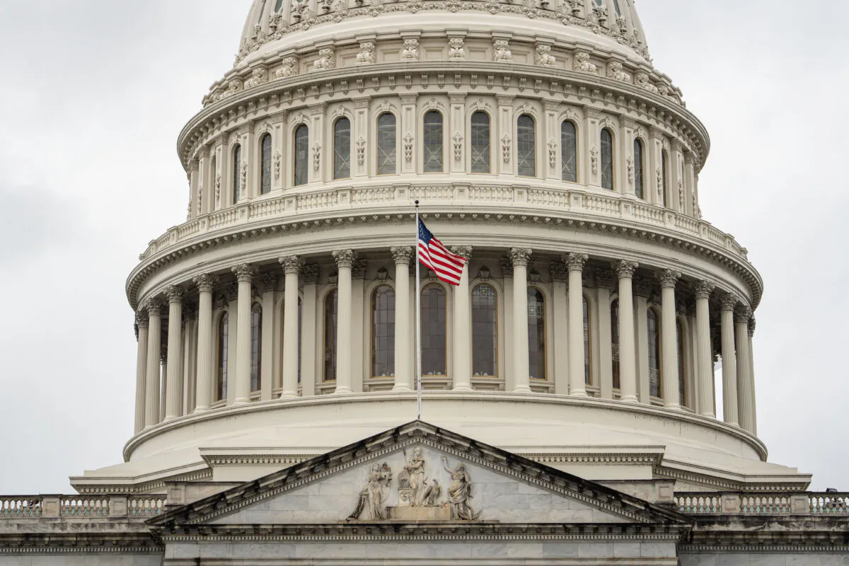 The American flag on the U.S. Capitol building in Washington on May 13, 2025. (Madalina Vasiliu/The Epoch Times)