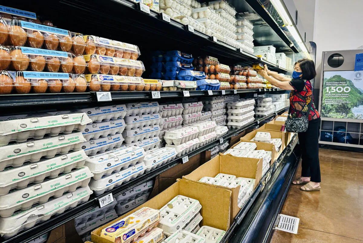 A woman shops for eggs at a Walmart in Rosemead, Calif., on April 11, 2025. (Frederic J. Brown/AFP via Getty Images)