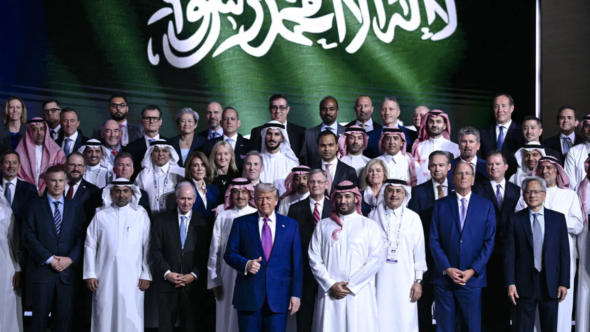 U.S. President Donald Trump (front row-C) and Saudi Crown Prince Mohammed Bin Salman (C-R) pose for a group picture during the Saudi-U.S. investment forum at the King Abdul Aziz International Conference Center in Riyadh, Saudi Arabia, on May 13, 2025. (Brendan Smialowski/AFP via Getty Images)