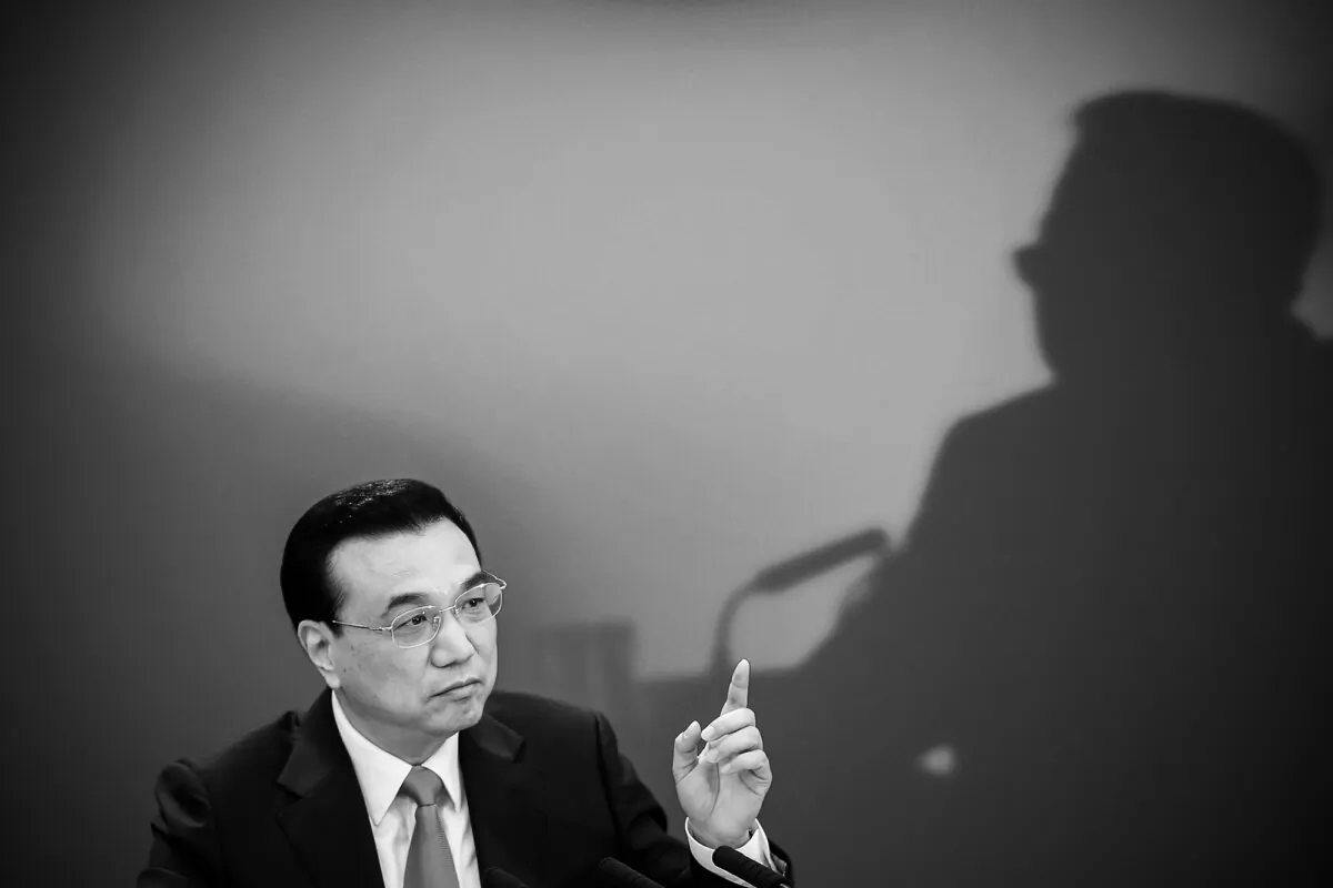 Chinese Premier Li Keqiang answers question during the regime's annual news conference following the closing session of the National People's Congress at the Great Hall of the People in Beijing on March 15, 2015. (Feng Li/Getty Images)