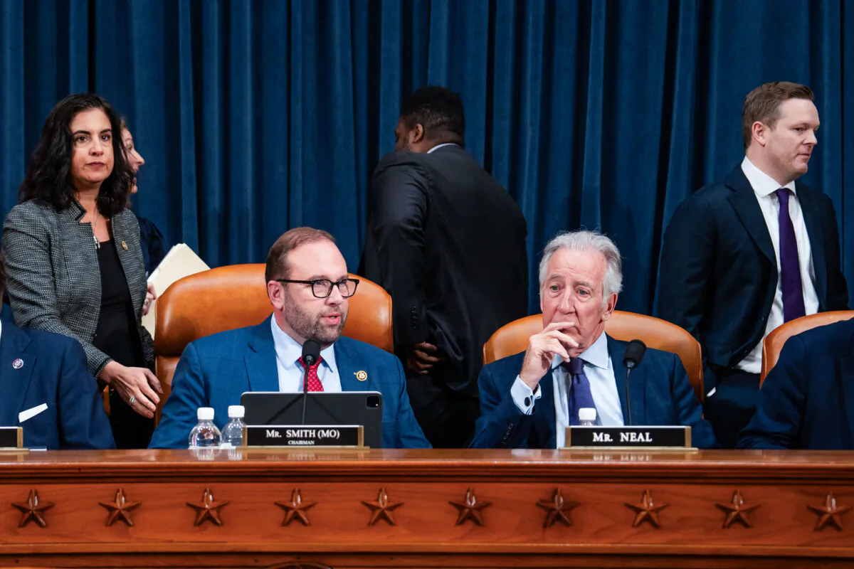 House Committee on Ways and Means Chairman Rep. Jason Smith (R-Mo.) (L) and Ranking Member Rep. Richard E. Neal (D-Mass.) (R) speak ahead of a hearing on Capitol Hill in Washington on May 13, 2025. (Madalina Vasiliu/The Epoch Times)