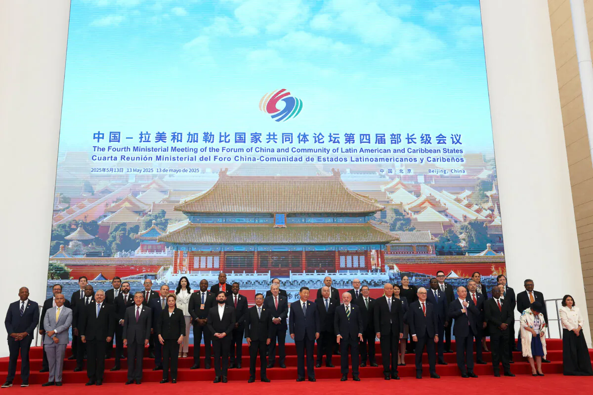 Chinese leader Xi Jinping, Brazilian President Luiz Inácio Lula da Silva, Chilean President Gabriel Boric, Colombian President Gustavo Petro, and others attend a group photo session before the opening ceremony for the China–Community of Latin American and Caribbean States Forum in Beijing, on May 13, 2025. (Florence Lo/Pool/Reuters)