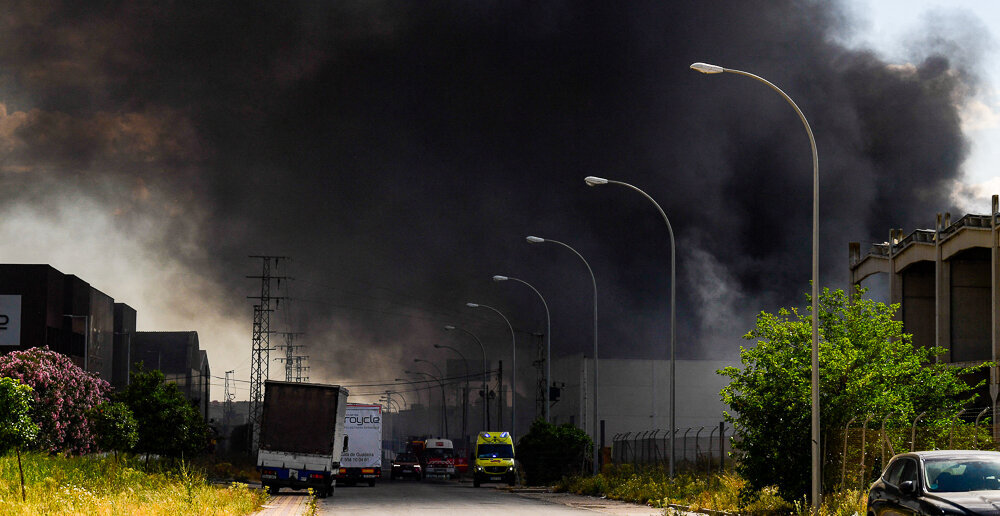 Day in Photos: Chemicals Burn in Spain, Strawberry Picking in India, and Golden Monkeys