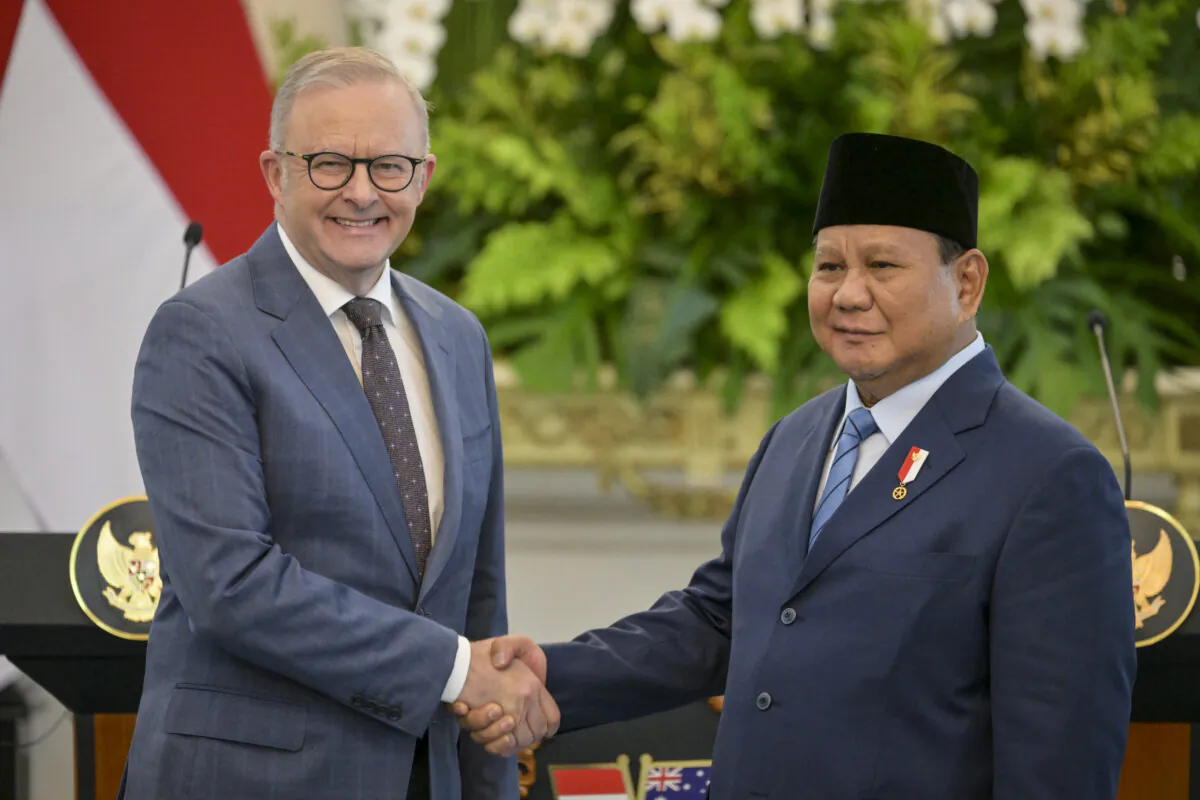 Indonesian President Prabowo Subianto (R) and Australian Prime Minister Anthony Albanese (L) shake hands after a joint press conference at the Merdeka Palace in Jakarta, Indonesia on May 15, 2025. (Bay Ismoyo/AFP via Getty Images)