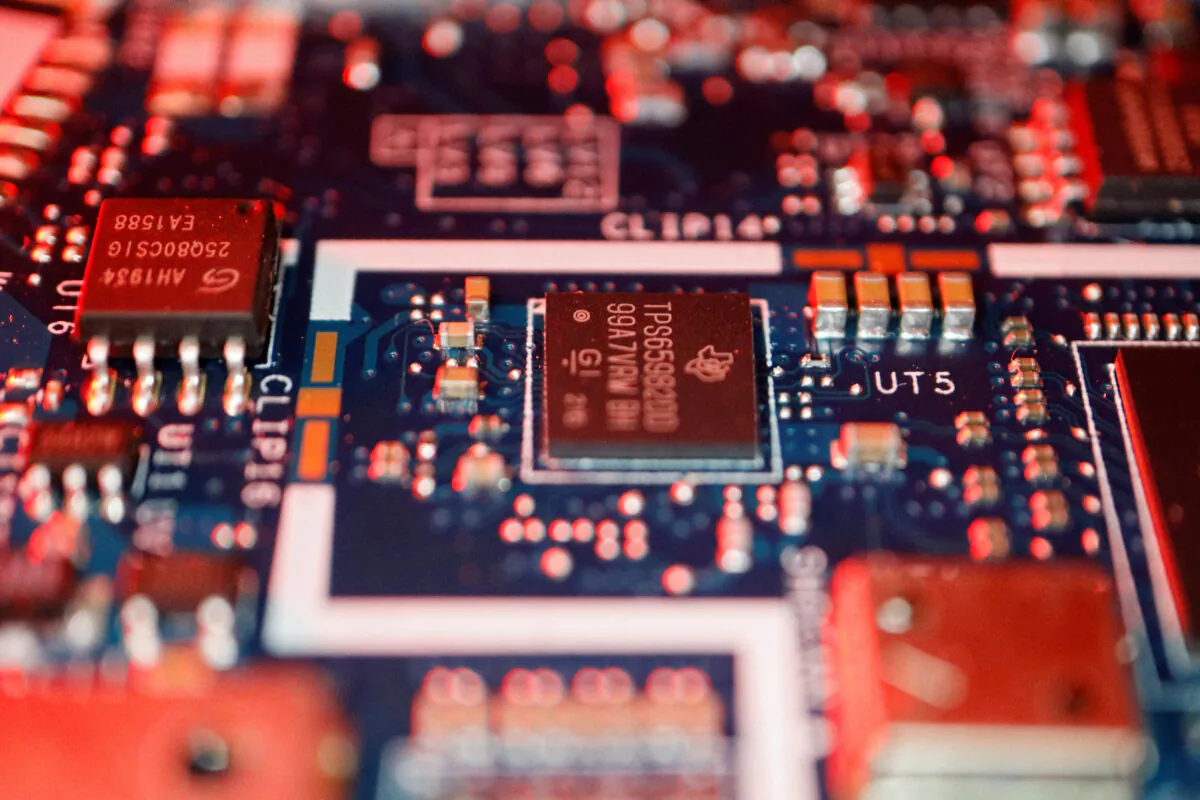 Semiconductor chips are seen on the circuit board of a computer on Feb. 25, 2022. (Reuters/Florence Lo/Illustration/File Photo)