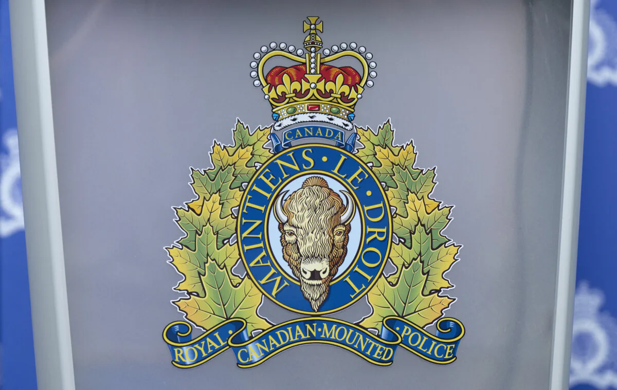 The RCMP logo is seen at a news conference on June 24, 2023. (The Canadian Press/Adrian Wyld)