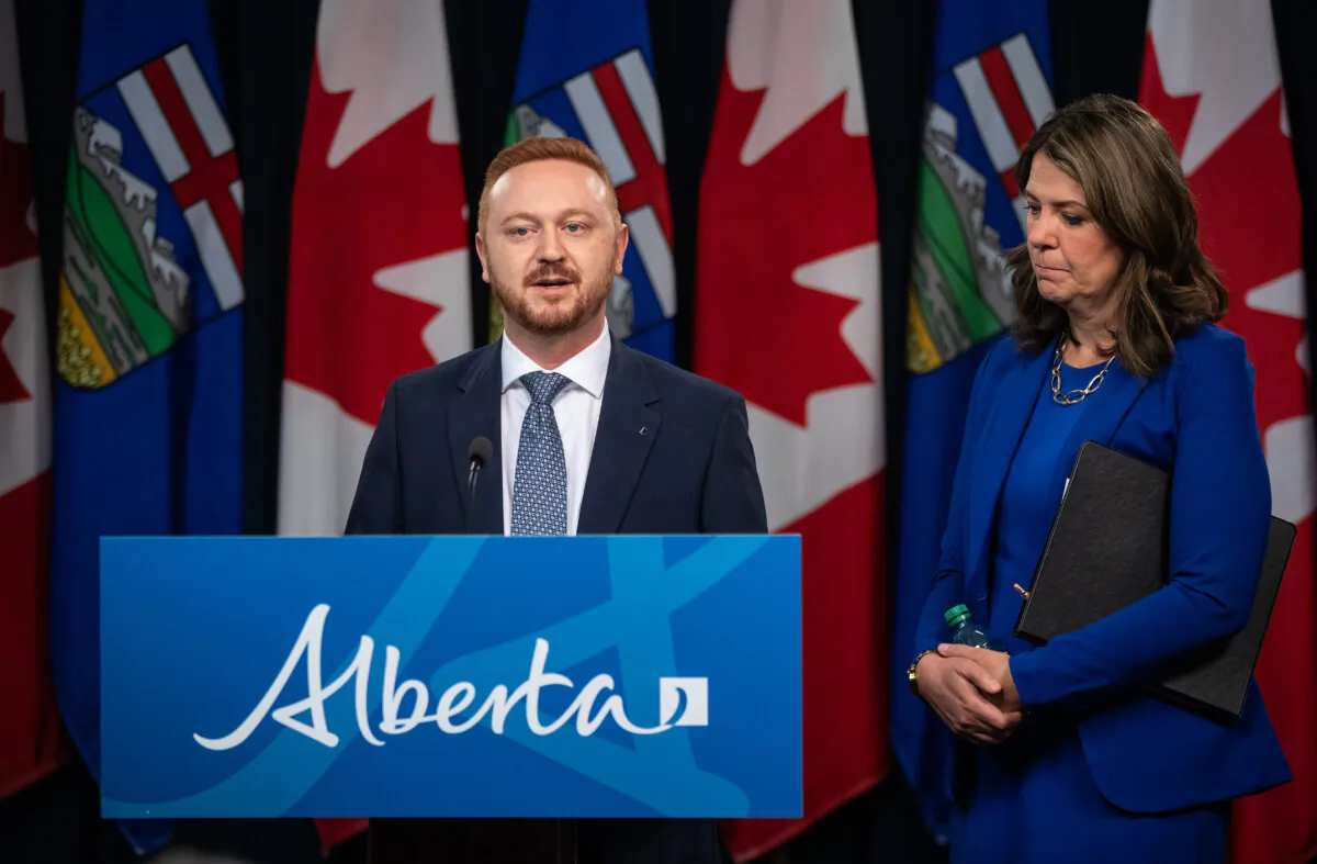 Alberta Premier Danielle Smith and Minister of Justice Mickey Amery appear at a press conference in Edmonton on April 29, 2025. (Jason Franson/The Canadian Press) 