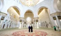 Day in Photos: Donald Trump in UAE, Fire in Abidjan, and Colorful Village
