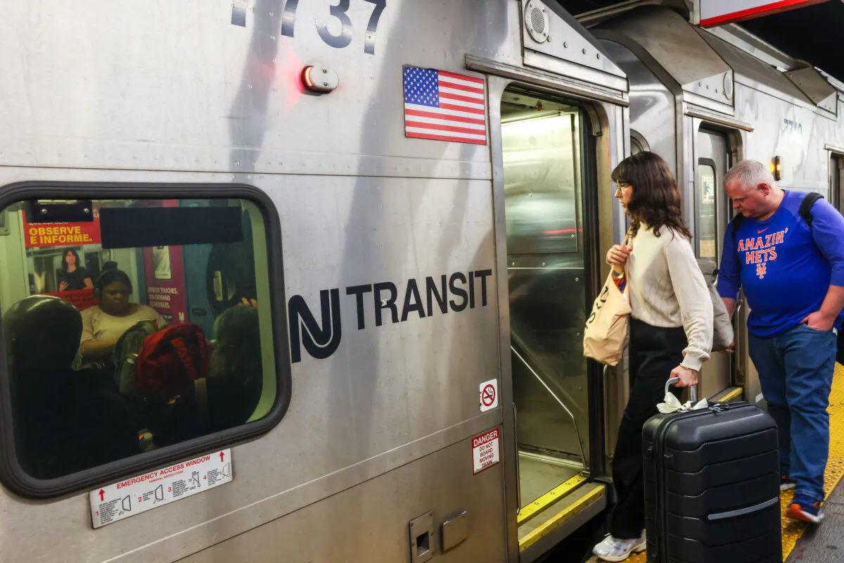 People board a New Jersey Transit train in Manhattan in New York City on May 15, 2025. (Spencer Platt/Getty Images)