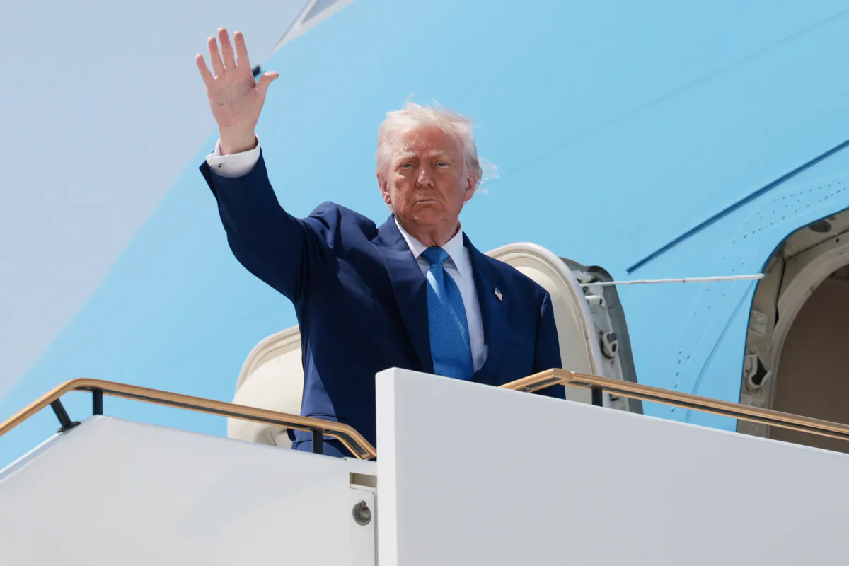 President Donald Trump boards Air Force One as he departs the Al Bateen Executive Airport in Abu Dhabi, on May 15, 2025. (Win McNamee/Getty Images)