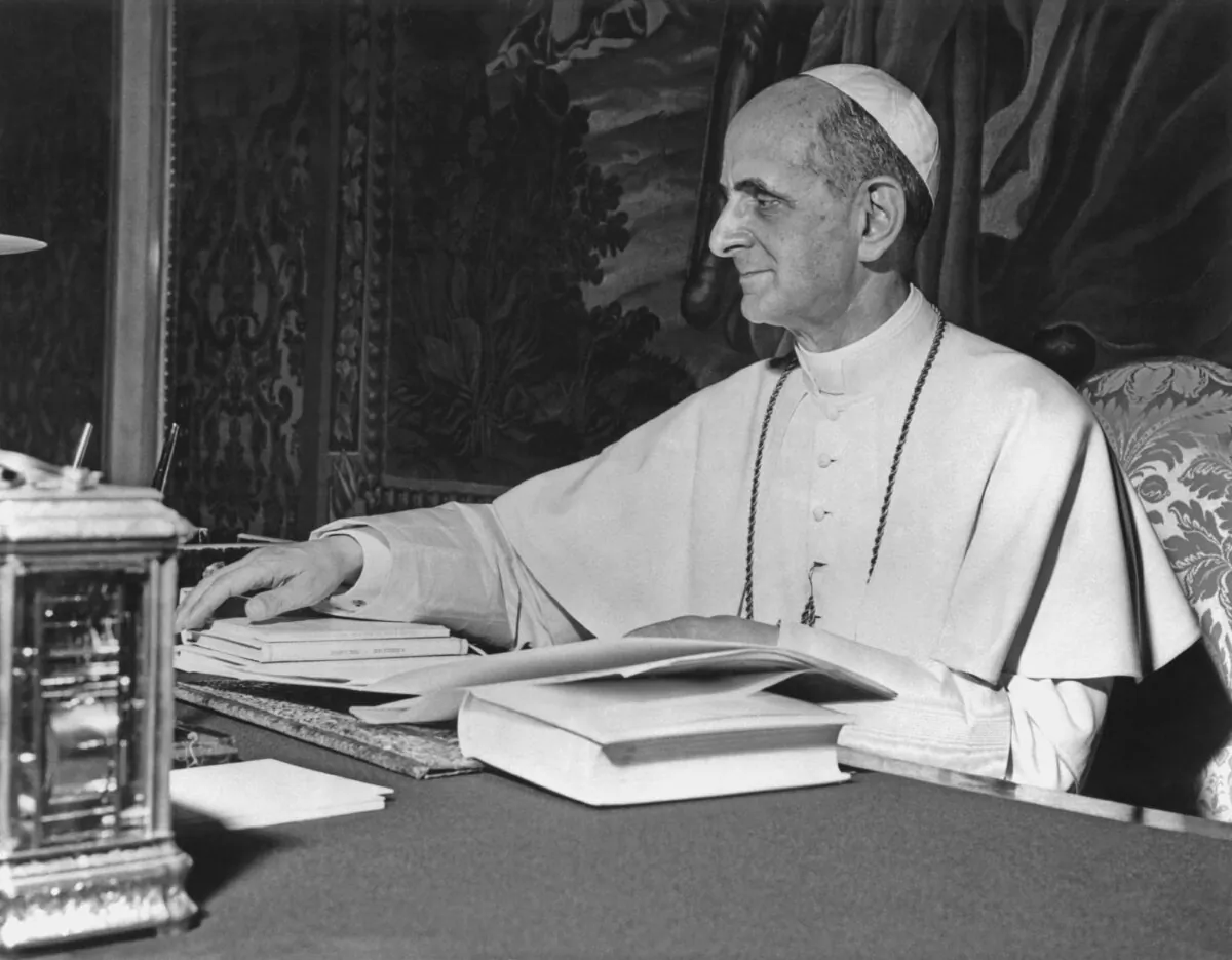 Pope Paul VI at his desk in the Vatican City circa 1970. Pope Paul guided the Second Vatican Council to its conclusion in 1965, implementing numerous reforms. (FPG/Getty Images)