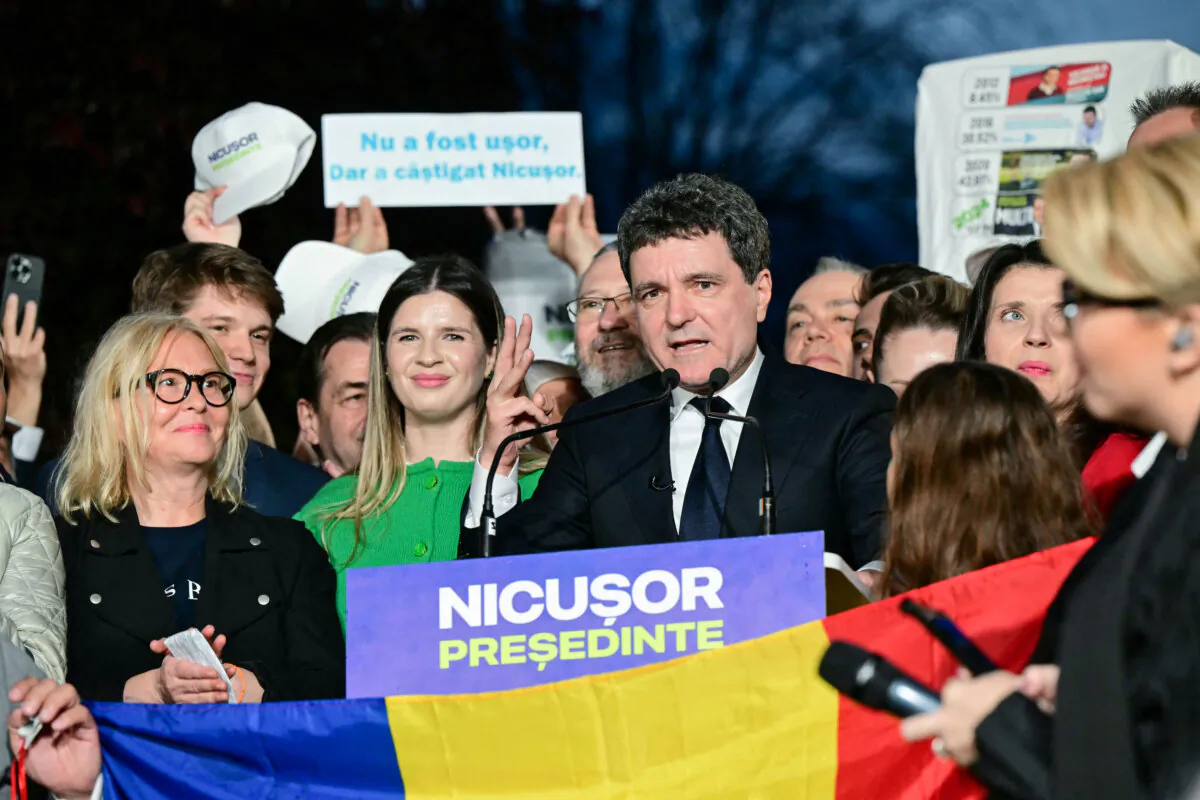 Romanian presidential candidate Nicusor Dan speaks to supporters after exit poll results were announced in Bucharest, on May 18, 2025. (Daniel Mihailescu/AFP via Getty Images)