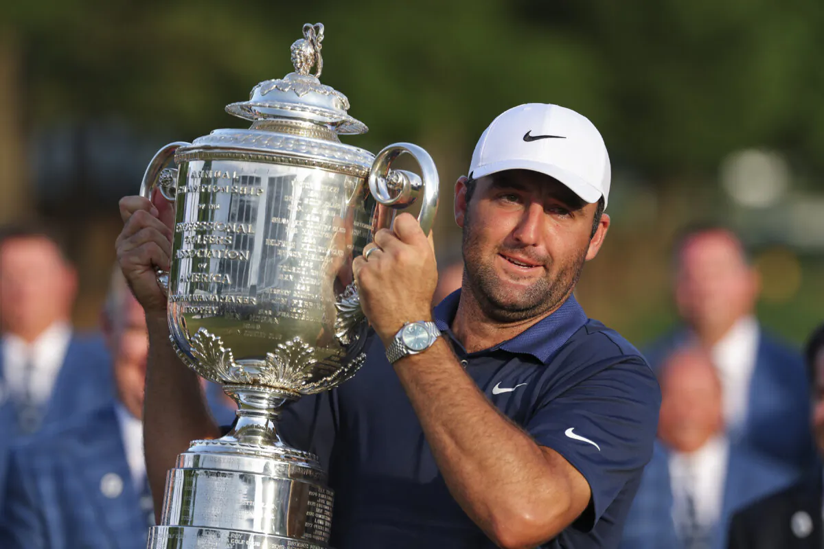 Scottie Scheffler of the United States celebrates with the Wanamaker Trophy after winning the 2025 PGA Championship at Quail Hollow Country Club in Charlotte, North Carolina on May 18, 2025. (Kevin C. Cox/Getty Images)