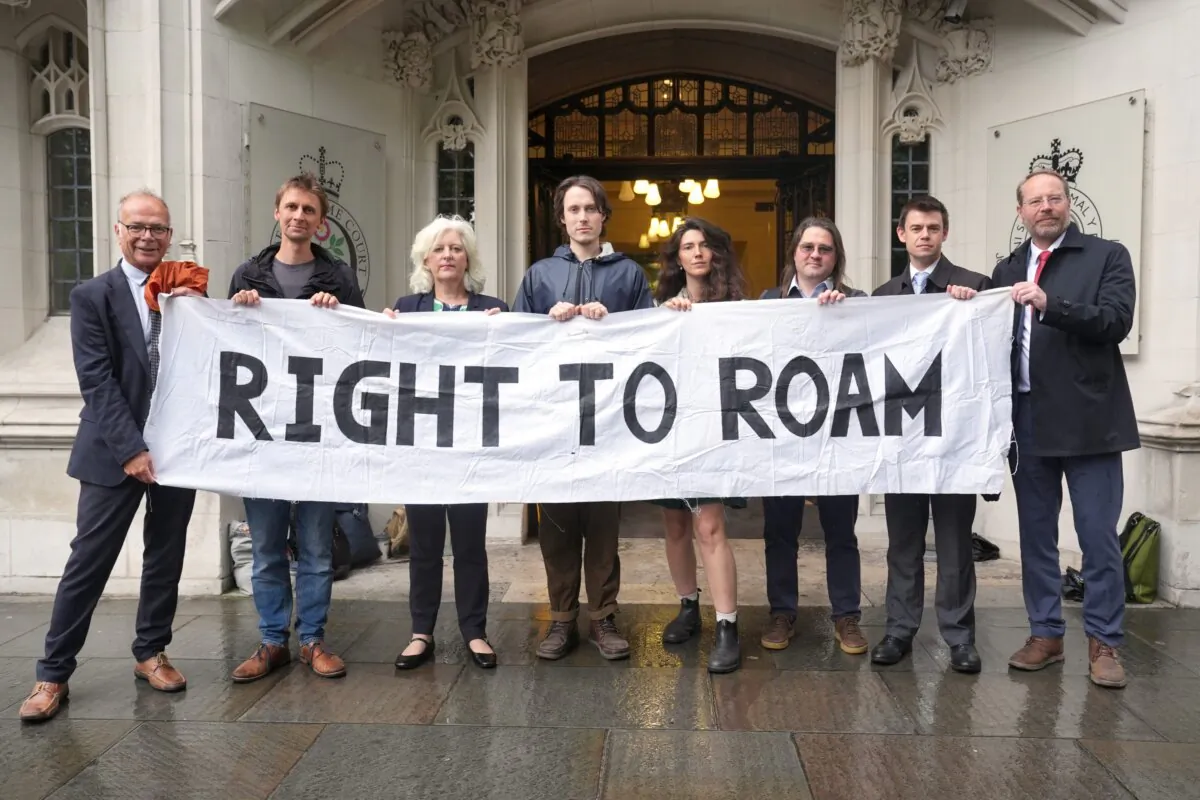 Labour MP for Stroud, Simon Opher (left), Liberal Democrat MP for South Devon, Caroline Voaden (third left), Labour MP for Bolton West, Phil Brickell (second right), and Labour MP for Rossendale and Darwen, Andy McNae (right) joined campaigners outside the Supreme Court in London in an undated file photo. (Lucy North/PA)