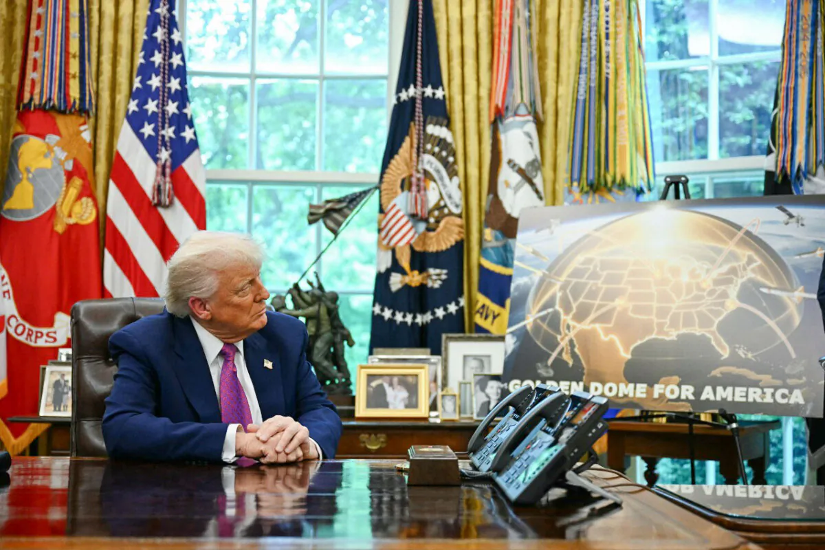 President Donald Trump listens during an announcement about the Golden Dome missile defense shield in the Oval Office, on May 20, 2025. (Jim Watson/AFP via Getty Images)