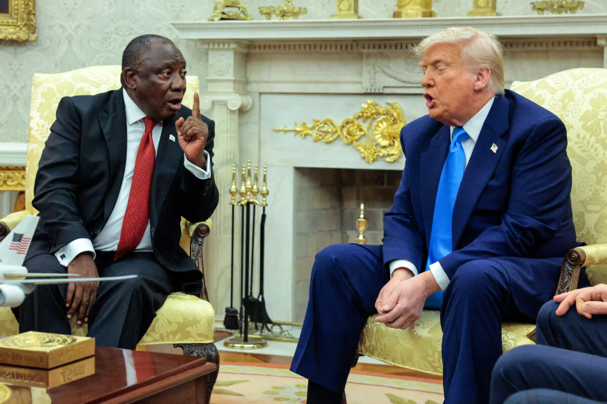 President of South Africa Cyril Ramaphosa (L) and U.S. President Donald Trump exchange words during a meeting in the Oval Office of the White House on May 21, 2025. (Chip Somodevilla/Getty Images)