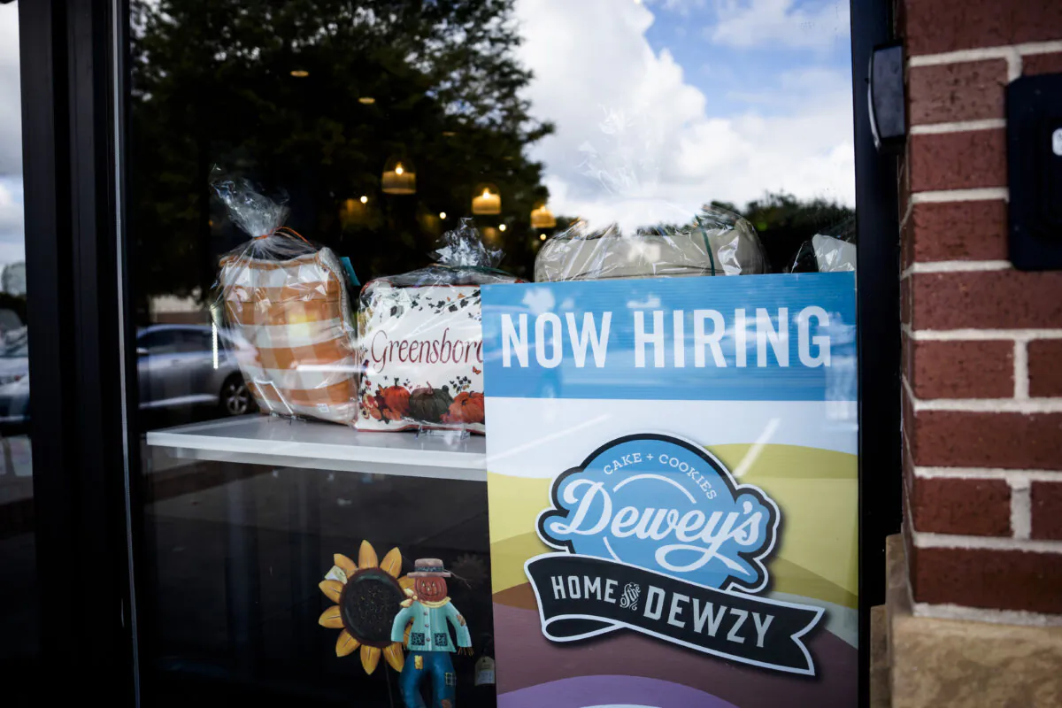 A "Now Hiring" sign at a coffee shop in Greensboro, N.C., on Sept. 19, 2024. (Madalina Vasiliu/The Epoch Times)