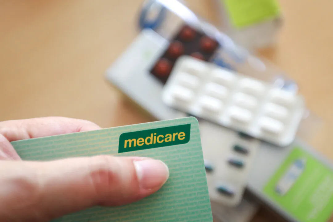 In this photo illustration, an Australian Medicare card is displayed with prescription medicines in Sydney, Australia, on March 25, 2025. (Lisa Maree Williams/Getty Images)