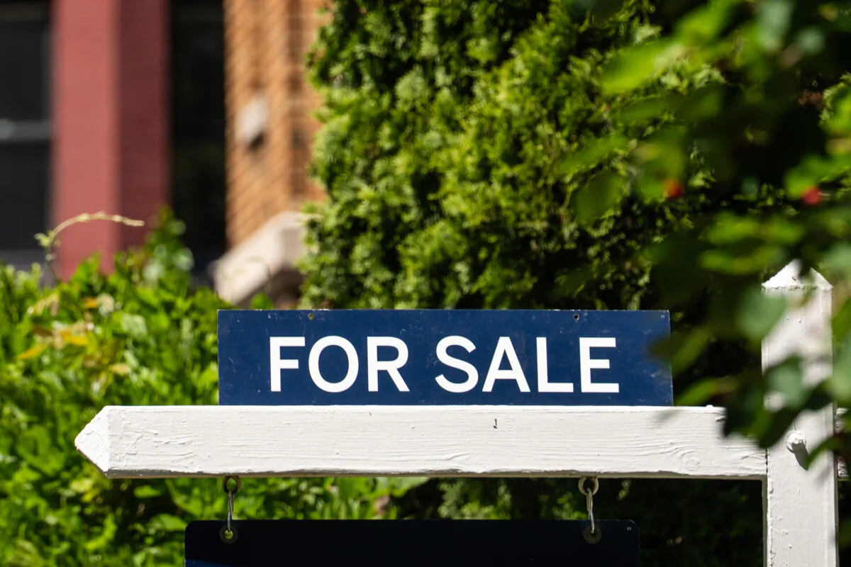 A sign in front of a property for sale in Washington on May 19, 2025. (Madalina Vasiliu/The Epoch Times)
