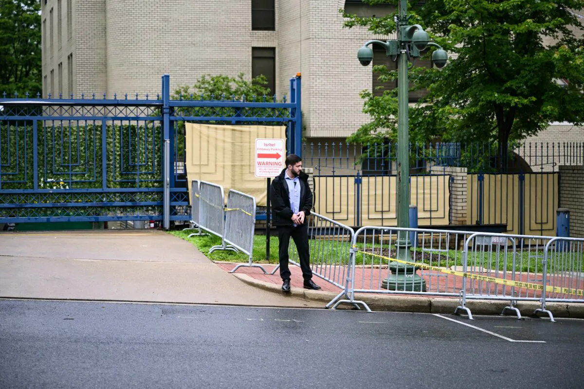 Security officers surround the Israeli Embassy in Washington following a shooting that left two people dead, on May 22, 2025. (Brendan Smialowski/AFP via Getty Images)          