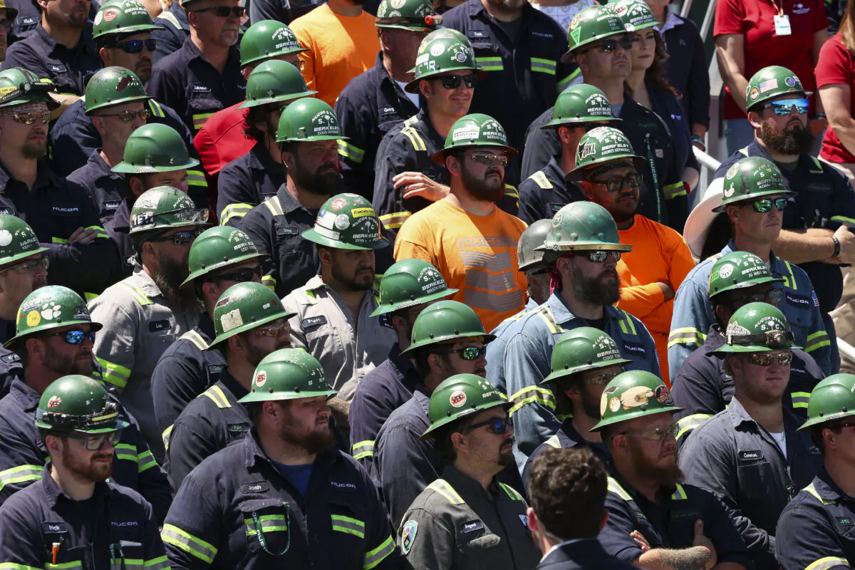 Workers listen as Vice President J.D. Vance speaks during a tour of Nucor Steel Berkeley in Huger, S.C., on May 1, 2025. (Kevin Lamarque/Pool/AFP via Getty Images)