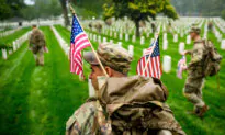 Day in Photos: Memorial Day, Plane Crash, and Renaissance Exhibition
